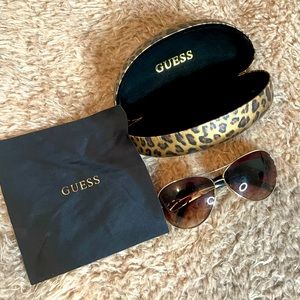 Guess designer sunglasses in good condition, with case and all complete.